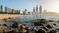 Calm waves lapping the quiet golden sands of Haeundae Beach, Busan