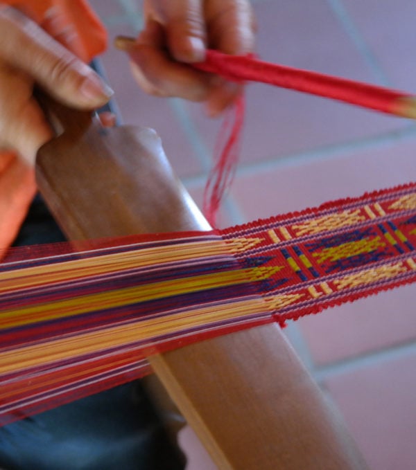 Close up of silk weaving by hand