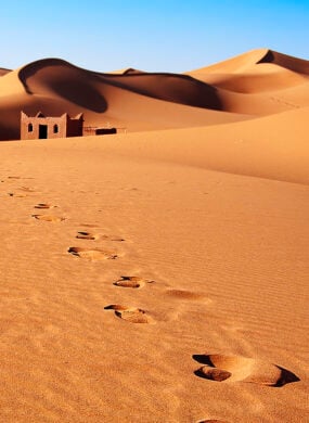 Sand dunes with footprints