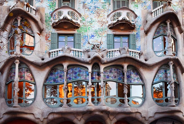 Casa Batllo, a Gaudi-designed building with colourful walls and ornate wavy balconies in Barcelona