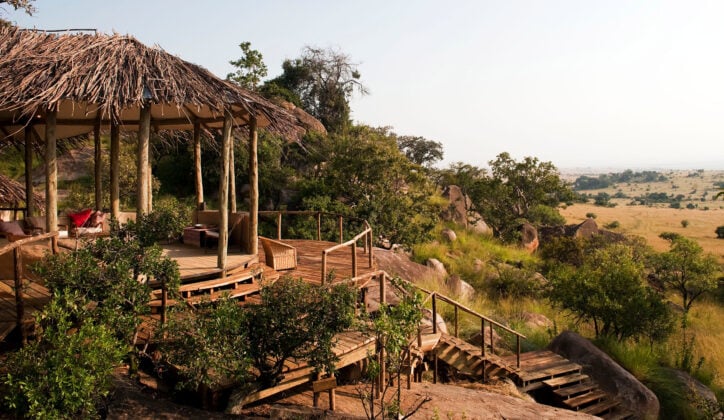 Outdoor seating area at the Lamai Serengeti lodge, overlooking African landscape