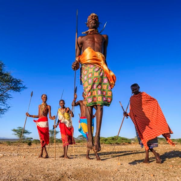 Warrior from Samburu tribe performing traditional jumping dance, Kenya, Africa