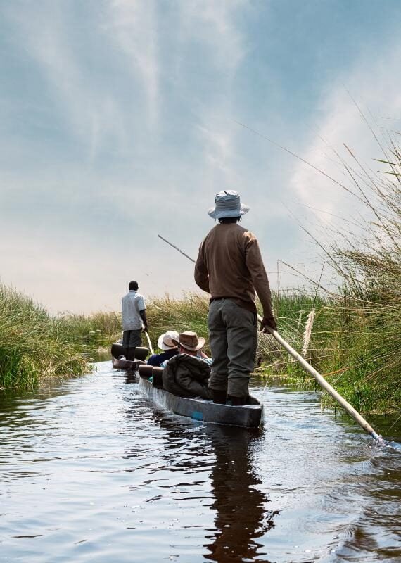 Adventure boat trip in a traditional Makoro at the Okavango Delta, Botswana