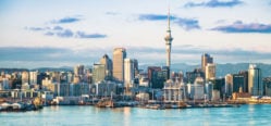 An early morning view of the CBD of Auckland, across the water of Waitemata Harbor.