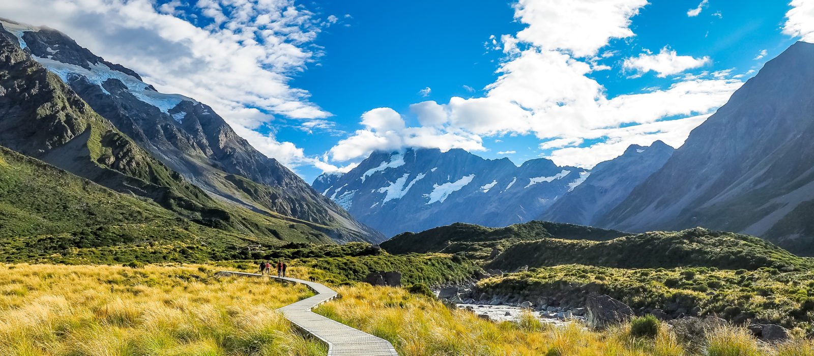 Boardwalk through the mountainous landscape of the Hooker Valley Track, Mount Cook National Park, in summer