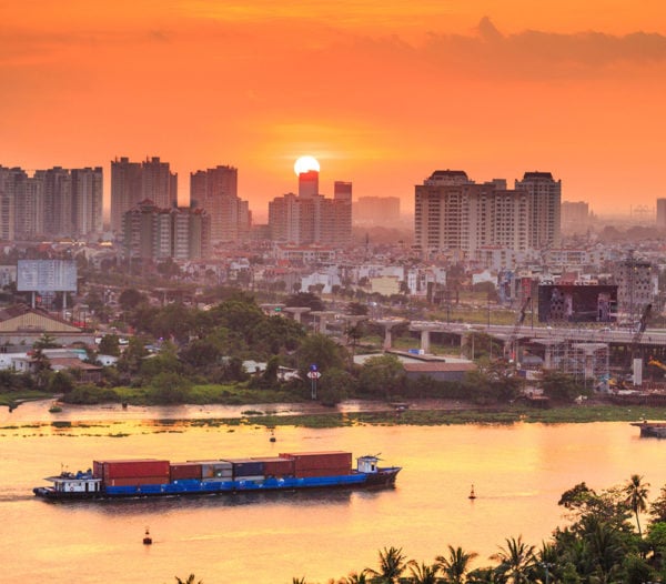 The sun setting behind the city of Saigon