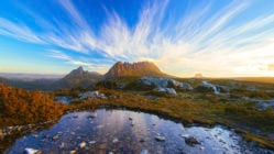 Panoramic view of cradle mountain in the golden light