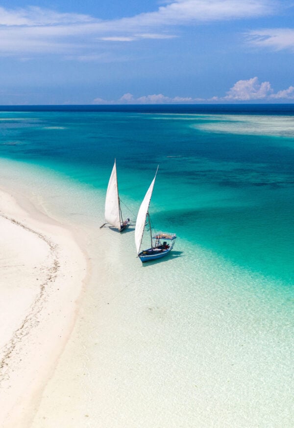 Dhow boats moored at a secluded sandbank at Pemba Island, Tanzania.